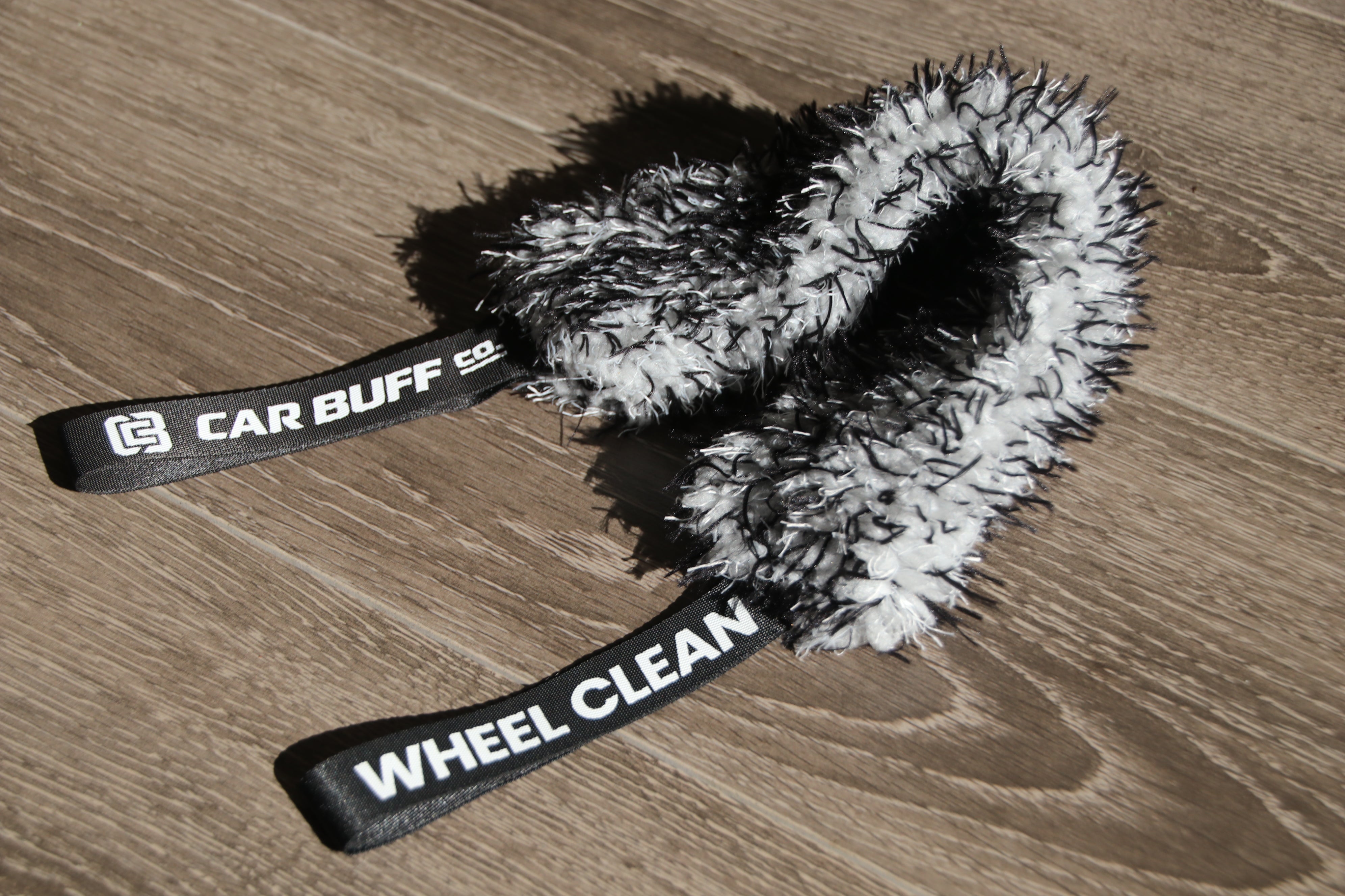 Car Buff Co Wheel Belt showing the looped chenille cleaning heads and labelled "Wheel Clean" strap